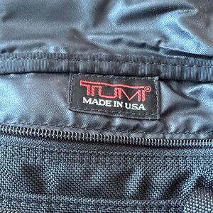 Tumi Black vintage Travel carry on